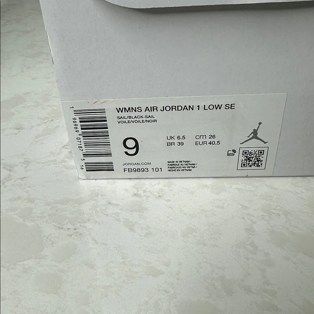 Nike Sail and Black Air Jordan 1 Low SE
